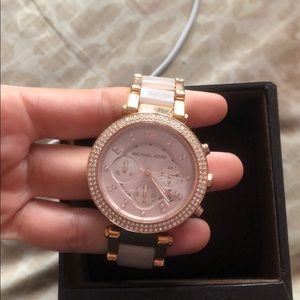 Michael Kors Rose gold timepiece watch